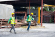 © NVB Stocker - Asian  man concrete factory worker working at precast factory. Engineering worker in safety hardhat at factory industrial facilities. Heavy Industry Manufacturing Factory. Prefabricated concrete walls