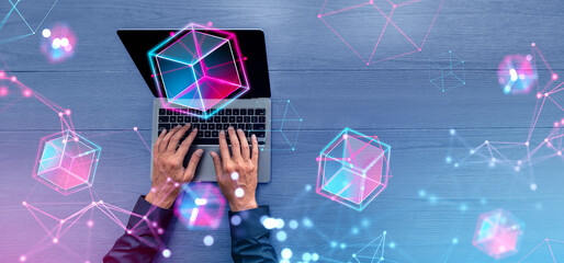 Poster - man hands with laptop, blockchain interface and metaverse