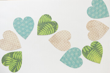 Canvas Print - garland of decorative machine cut scrapbooking paper hearts on blank paper