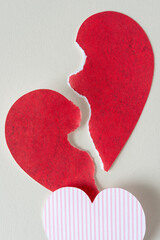 Wall Mural - torn and solid paper hearts on blank paper