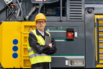 Aufkleber - Engineer with digital tablet next to road construction machine