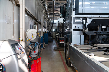 Poster - Trucks repair in car service.
