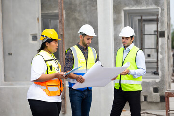 Wall Mural - hispanic engineering man and fat female. Ethnic diversity worker people, Success teamwork. Group of professional engineering people wearing hardhat safety helmet meeting discussion in new project