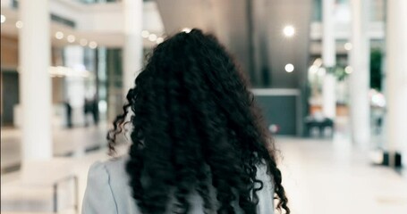 Poster - Happy, confidence and face of a businesswoman in the office walking with healthy, long and curly hair. Happiness, smile and portrait of a young professional female person in the modern workplace.