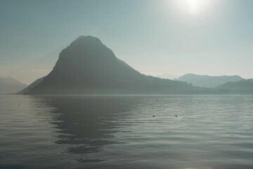 Sticker - Tranquil lake reflecting the majestic mountains in the background