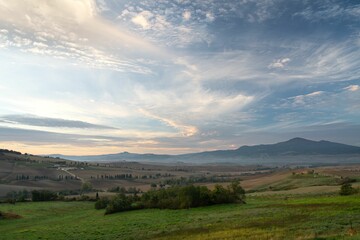 Poster - Idyllic countryside view of the rolling hills of the Tuscany region near the town of Pienza, Italy