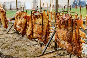 Poster - Barbecue ribs on the ground fire. Typical Brazilian barbecue