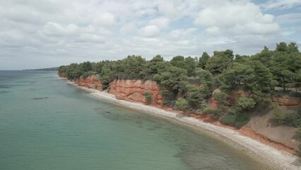 Wall Mural - Drone shot around coastal Red Rocks Of Metamorphosis with seascape