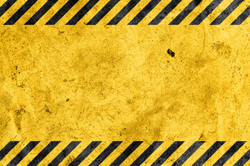 Grunge yellow and black diagonal stripes. black and yellow warning line striped background
