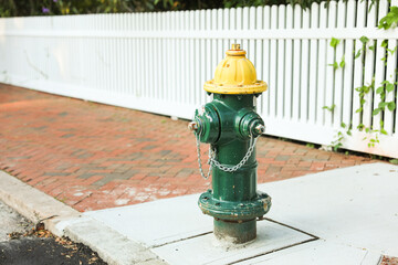 fire hydrant on a city street embodies preparedness, safety, and urban infrastructure, serving as a symbol of protection and readiness for potential emergencies