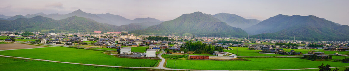 Wall Mural - 兵庫県・山に囲まれる朝の道の風景、神崎郡市川町
