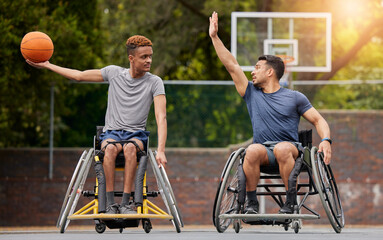 sports, basketball and men in wheelchair on court for training, exercise and workout on outdoor park