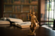 © utah51 - lady of justice on judge's desk. law education of jurisprudence constitution and legal learning.