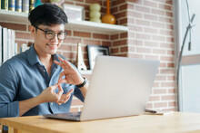 Close Up Asian Man Make Gesture Hand About Sign Language To Teaching Or Talking To Colleague In Office Meeting Room For Business Lifestyle Concept