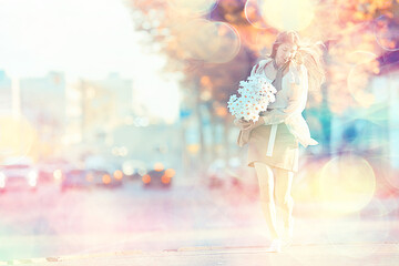 Wall Mural - girl holding a bouquet of flowers a walk in the park / romantic young beautiful cute model, love fee