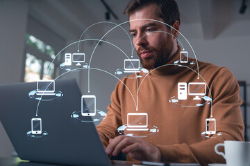 Wall Mural - thoughtful businessman in casual wear typing on laptop at office workplace. concept of distant work,