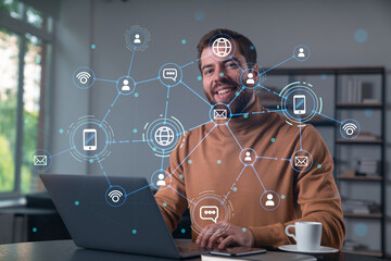 Wall Mural - thoughtful businessman in casual wear typing on laptop at office workplace. concept of distant work,