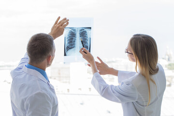 Wall Mural - Doctors discuss x-ray