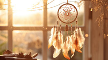 Dream Catcher With Feathery Hangings Is Hanging Out Of A Window