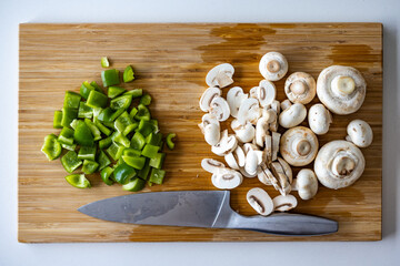 Chopping board muschroom and pepper for healthy or vegetarian food