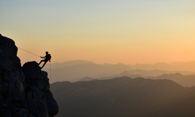 Wall Mural - Climbing a Dangerous Rock