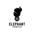 vector logo of an elephant standing on a film reel, cinema logo