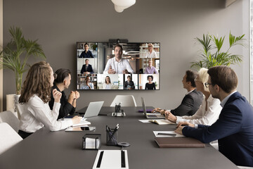 business teem of office employees and freelancers meeting on online video chat, conference call. cow