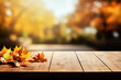 Wooden cutting board with autumn leaves to the side and a blurred autumn landscape in the background, plenty of overhead and copy space, made with generative ai