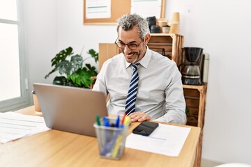 Sticker - Middle age grey-haired man business worker having video call at office