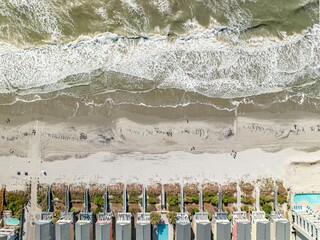 Sticker - Aerial view of stunning view of beachfront condos situated along an oceanfront in Surfside Beach