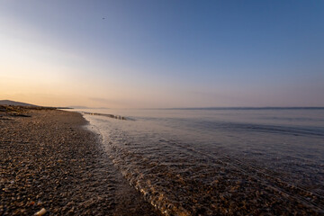 a sunset on the sea beach