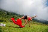Fototapeta  - Girl doing somersaults