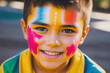 © Carlos Cainã - Happy child with painted face. Generative AI