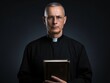 a catholic christian church priest wearing black cassock robe holding the holy bible book in his hands. face seen. isolated on dark grey / black background. Generative AI
