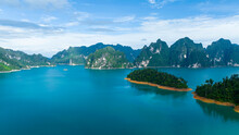Aerial View At Khao Sok National Park Cheow Lan Dam Lake With Blue Sky Background  In Surat Thani, Thailand