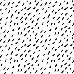 Abstract seamless pattern with small black lines. Vector illustration of specks. Monochrome background with randomly located asymmetric spots. Texture with cartoon rain or snow.