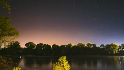 Wall Mural - 4k Hyperlapse Meteors Fly Across The Night Sky. Night Sky Above River. From Dusk To Dawn. Stars Float Across Sky. Night Sky Turns Into Morning. Dawn Is Coming. Meditation By The Water. Calmness And