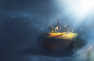 Poster - low key image of beautiful queen or king crown over gold treasure chest. vintage filtered. fantasy medieval period