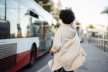 A Positive And Confident Woman Missing The Bus. Modern City Lifestyle And Public Transportation Concept.