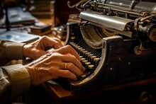 Person Typing On Old Fashioned Typewriter With Pair Of Hands.