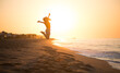 © Subbotina Anna - Beauty young happy woman jumping, sea side. Girl's silhouette on a summer beach over sunrise. Beautiful woman enjoying nature in sunlight. Sunset. Healthy lifestyle, vacation, happiness concept