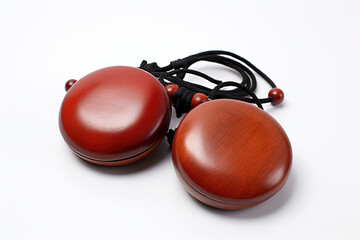 Pair of wooden castanets - isolated on white