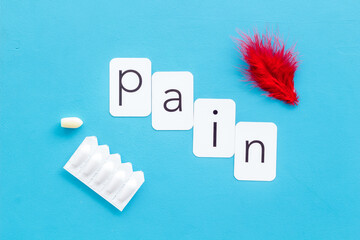 Wall Mural - Word pain with red pen and rectal suppositories. Treatment concept