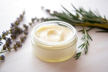 Top View Of Herbal Extract Moisturizer Cream Jar With Organic Natural Ingredients. Leafy Background