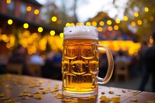 Close-up Of A Traditional German Beer Mug Filled To The Brim, Set Against A Backdrop Of The Oktoberfest Celebration