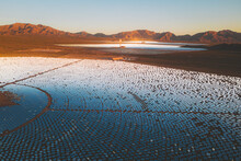 Aerial View Of A Concentrated Solar Thermal Plant At Sunrise, Mojave Desert, California, Near Las Vegas, United States.
