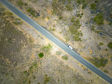 Aerial View Of A Campervan Along The Road At Piilani Highway, Maui, Hawaii, United States.