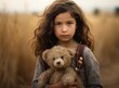 © lililia - Teddy Bear picnic happy child girl kid holding fluffy toy with little hand sitting on grass field. cute girl love teddy bear best friends hug holding together. Created with Generative AI technology.