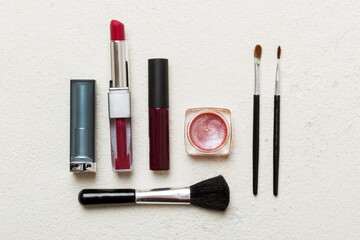 Wall Mural - Professional makeup tools. Top view. Flat lay. Beauty, decorative cosmetics. Makeup brushes set and color eyeshadow palette on table background. Minimalistic style