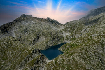 Wall Mural - aerial view of Lambino lake at dawn in Trentino